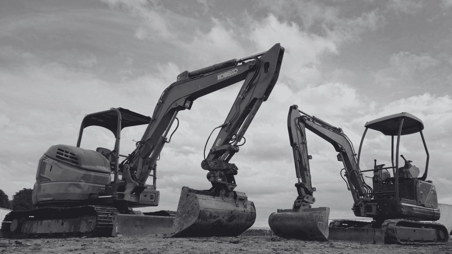 Excavator digging a trench at a worksite in Hauraki